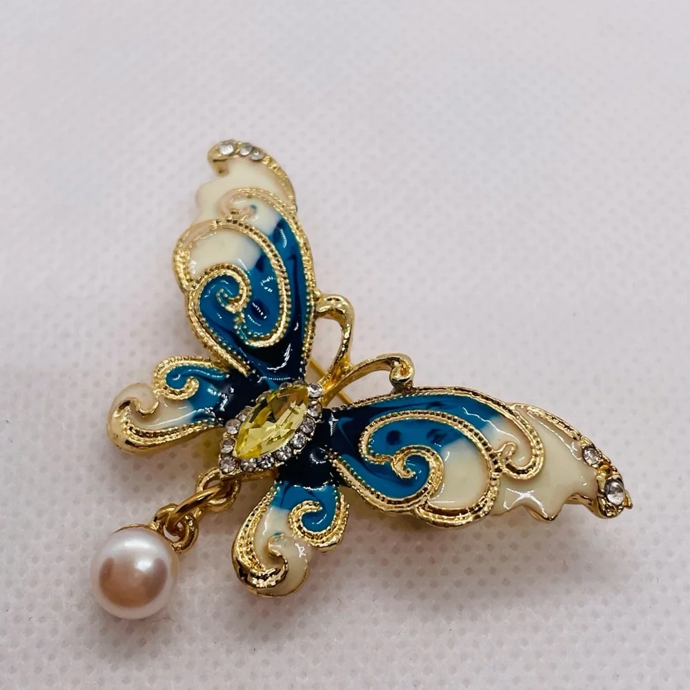 Elegant Gold and Blue Butterfly Brooch